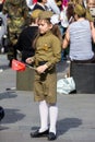 Victory Day in Moscow. Beautiful girl in military uniform with flag on Victory Day. Royalty Free Stock Photo