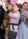 Victory Day in Moscow. A mother and her son doing selfie on the festive street.