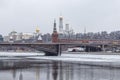 View of the snow-covered Kremlin hill with domes of churches, towers of the Kremlin wall Royalty Free Stock Photo