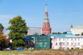 MOSCOW, RUSSIA - 21.09.2015. Vodovzvodnaya Tower of the Moscow Kremlin on background old destroyed houses. Russia