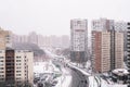 Moscow, Russia, 02.28.2021 - winter city landscape with falling snow. view of the town from a height. blizzard on the street with Royalty Free Stock Photo