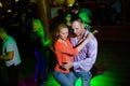 MOSCOW, RUSSIAN FEDERATION - OCTOBER 13, 2018: A middle-aged couple, a man and a woman, dance salsa among a crowd of dancing peopl Royalty Free Stock Photo