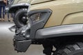 MOSCOW, SEP, 5, 2017: Close up view on russian off road car GAZ for for hard to reach areas and hunting. Car lights. Commercial Tr