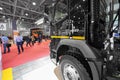 MOSCOW, SEP, 5, 2017: View on exhibit black Volvo 460 tipper truck and people on exhibition Mining World 2018. Commercial trucks f