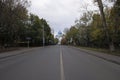 Perspective of Shosseynaya street with Nikolo-Perervinsky monastery in background. Cloudy autumn view.