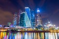 Moscow skyline panorama at night with colorful lights reflections on the surface of the river Moskva. Royalty Free Stock Photo