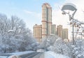 Moscow after snowfall, Russia. Scenic view of road and modern tall buildings. Cold and frost in winter Moscow city