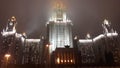 Moscow State University main campus in fog at night