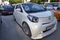 Moscow. Summer 2018. White Toyota IQ on the street. Tuned with air suspension, wide body kit, big wheels. Lowrider, stance tuning.