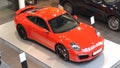 Moscow. Winter 2019. Bright Orange Porsche Carrera 911 991 4s in showroom. Top view Royalty Free Stock Photo