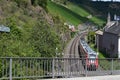 Hatzenport, Germany - 07 13 2020: Mosel valley railroad in Hatzenport with a train below the bridge