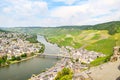 Moselle Valley Germany: View from Landshut Castle to the old town Bernkastel-Kues with vineyards and river Mosel in summer Royalty Free Stock Photo