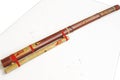 MoseÃÂ±o, traditional Andean bass wind instrument made with red colored bamboo.