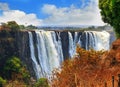 Mosi-o-tunya Victoria Falls with a nice blue cloudy sky in Zimbabwe, Southern Africa Royalty Free Stock Photo