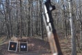 Mosin Nagant Gun Rifle with Targets in Focus in the Background Royalty Free Stock Photo