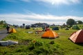 Tents and people at a campsite in Norway on the Lofoten Islands