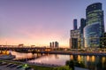 Moskva River with skyscrapers and bridge at dusk, Moscow, Russia Royalty Free Stock Photo