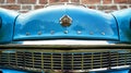 Moskvich 403, blue painted hood of the Russian car with poton body at a classic car show in Lehnin, Germany, August 21, 2021