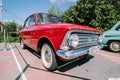 Moskvich-408 retro car in red colour, front side view. Moskvitch-408 is a small family car produced by the Soviet car Royalty Free Stock Photo