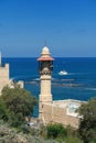 Mosque and boat at the entrance of the Jaffa seaport Royalty Free Stock Photo