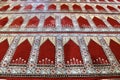 Mosque carpet featuring a red prayer rug pattern used in mosques Royalty Free Stock Photo