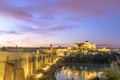 Mosque-Cathedral and the Roman Bridge in Cordoba at sunset, Andalusia, Spain Royalty Free Stock Photo