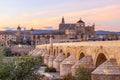 Mosque-Cathedral and the Roman Bridge at sunset in Cordoba, Andalusia, Spain Royalty Free Stock Photo