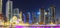 Mosque at Dubai Marina skyline architecture wealth luxury travel at night panorama in United Arab Emirates