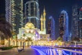 Mosque at Dubai Marina skyline architecture wealth luxury travel at night in United Arab Emirates