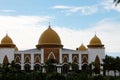 Beautiful golden yellow dome mosque in Ulakan, Pariaman, West Sumatra, Indonesia