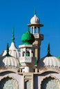 Mosque green domes and minaret towers