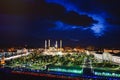 Mosque `Heart of Chechnya` against the backdrop of the night city of Grozny Royalty Free Stock Photo