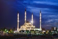 Mosque `Heart of Chechnya` against the backdrop of the night city of Grozny Royalty Free Stock Photo