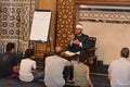 A mosque Imam preacher gives a lecture on the prophetic biography and the prophet practices and Sunnah