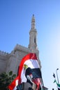 Mosque leader Ibrahim demonstrators carrying flags Royalty Free Stock Photo