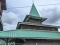 mosque made of wood and a green roof Royalty Free Stock Photo