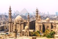 The Mosque-Madrassa of Sultan Hassan and the Pyramids in the background, Cairo, Egypt Royalty Free Stock Photo