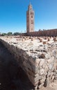 Mosque minaret with ruins