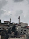 Mosque minarets flying between the clouds of the sky