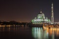 Mosque at night time vivid color reflect on water