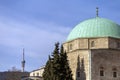 The mosque of pasha Qasim the Victorious with the TV Tower in the background in Pecs