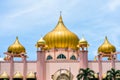 Kuching: Mosque in pink color and golden dome Royalty Free Stock Photo