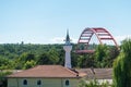 Mosque tower and bridge over Danube in Cernavoda