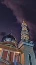 The mosque tower and clouds in the sky are very beautiful Royalty Free Stock Photo