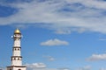 A Mosque Tower Surrounded by Clouds Royalty Free Stock Photo