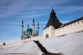 Mosque with turquoise spires, depending with white wall