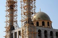 Mosque under construction against the blue sky