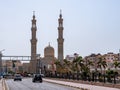 Beautiful islamic mosque temple on blue sky background. Islamic culture. Royalty Free Stock Photo