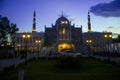 Mosque with cloudy sky in the time of sunset