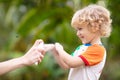 Mosquito on kids skin. Insect bite repellent